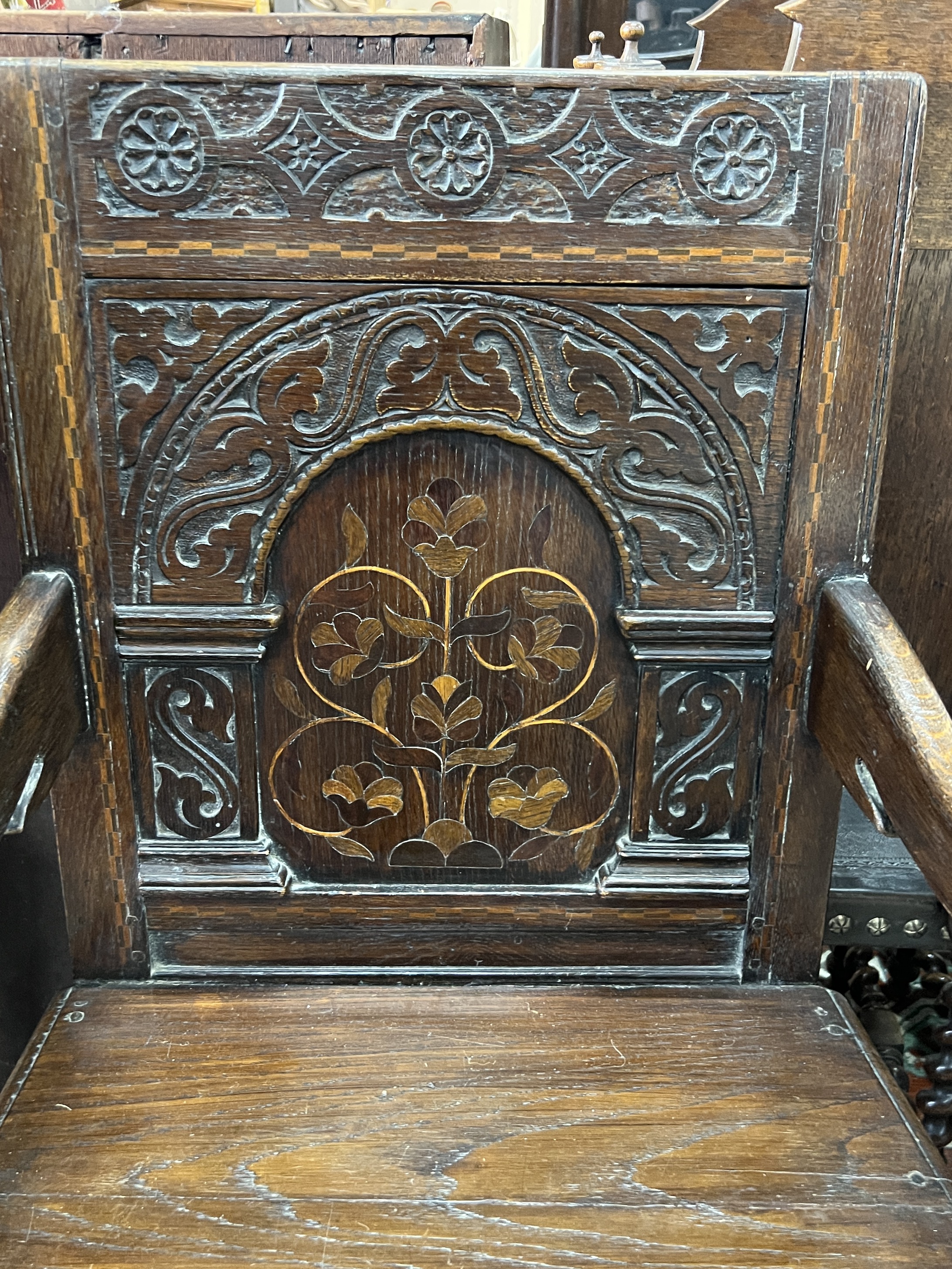 A 17th century style oak wainscot chair, width 58cm, depth 52cm, height 102cm